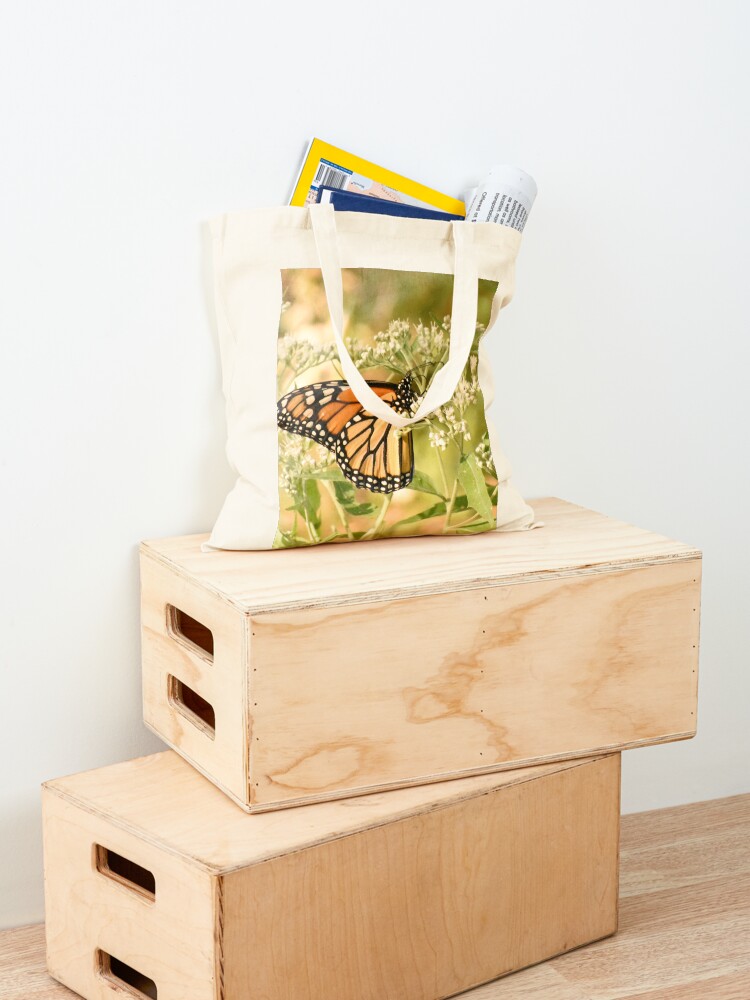 Alternate view of Monarch butterfly on white flowers Tote Bag