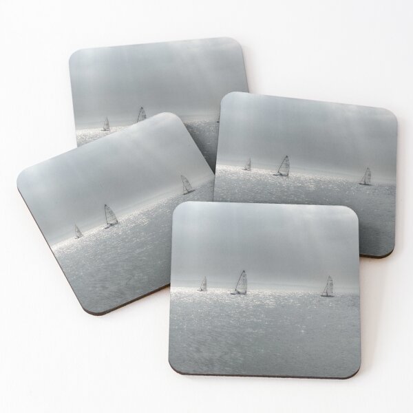 Item preview, Sun rays onto passing yachts  designed and sold by explorephotos.