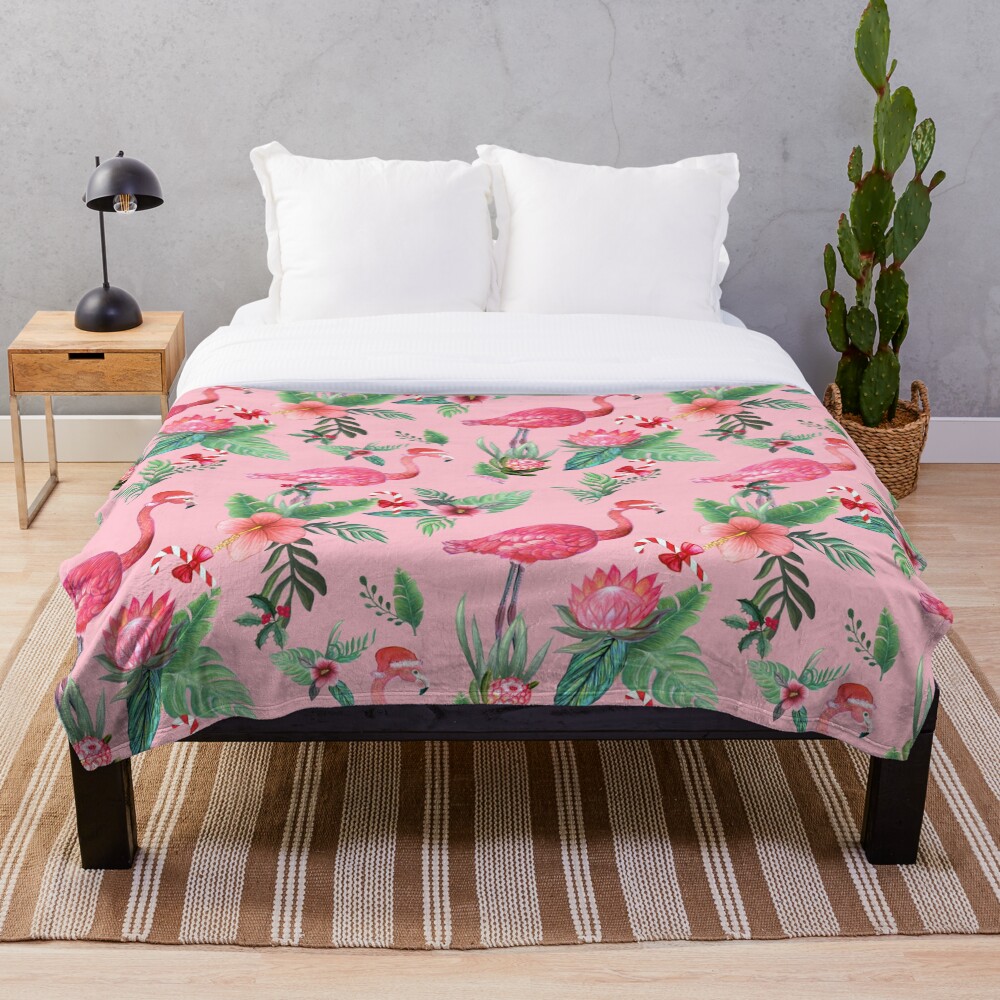 Pink Flamingo in Santa Hat with candy canes, holly and exotic flowers in watercolor Throw Blanket