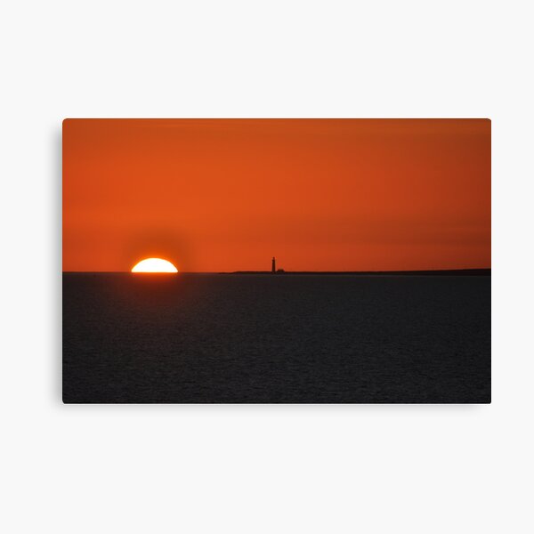 Sunset with lighthouse on Atlantic Canvas Print