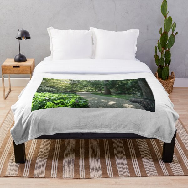 Garden path looks beautiful in sunlight Throw Blanket