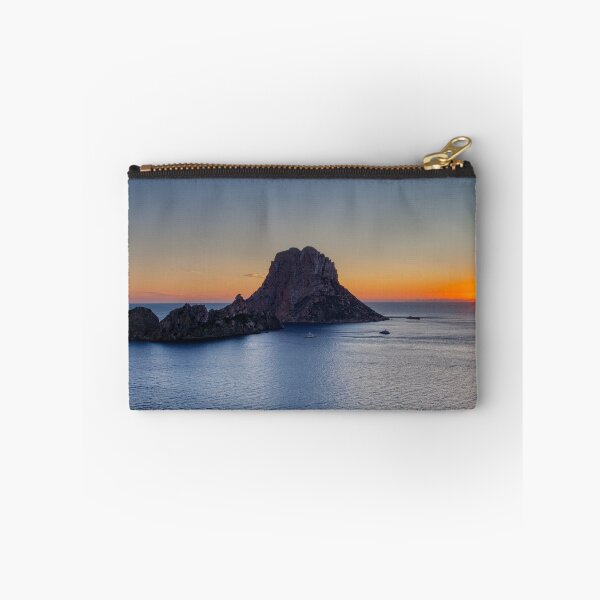 Item preview, Es Vedra with the sun setting behind the mountains on the mainland designed and sold by TheGecko02.
