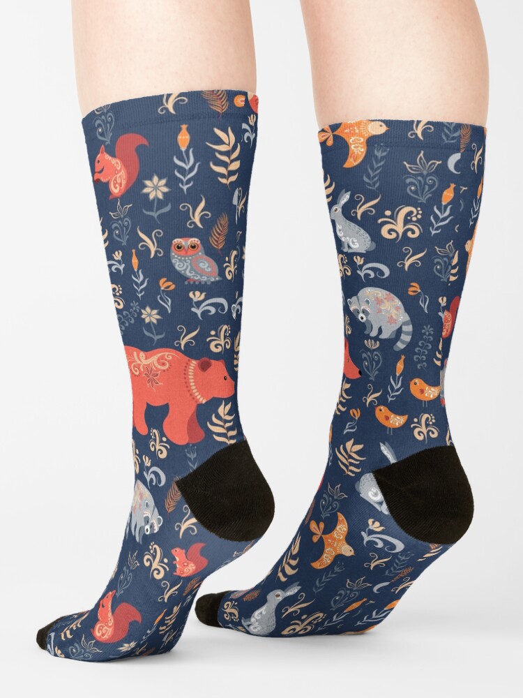 Alternate view of Fairy-tale forest. Fox, bear, raccoon, owls, rabbits, flowers and herbs on a blue background. Socks