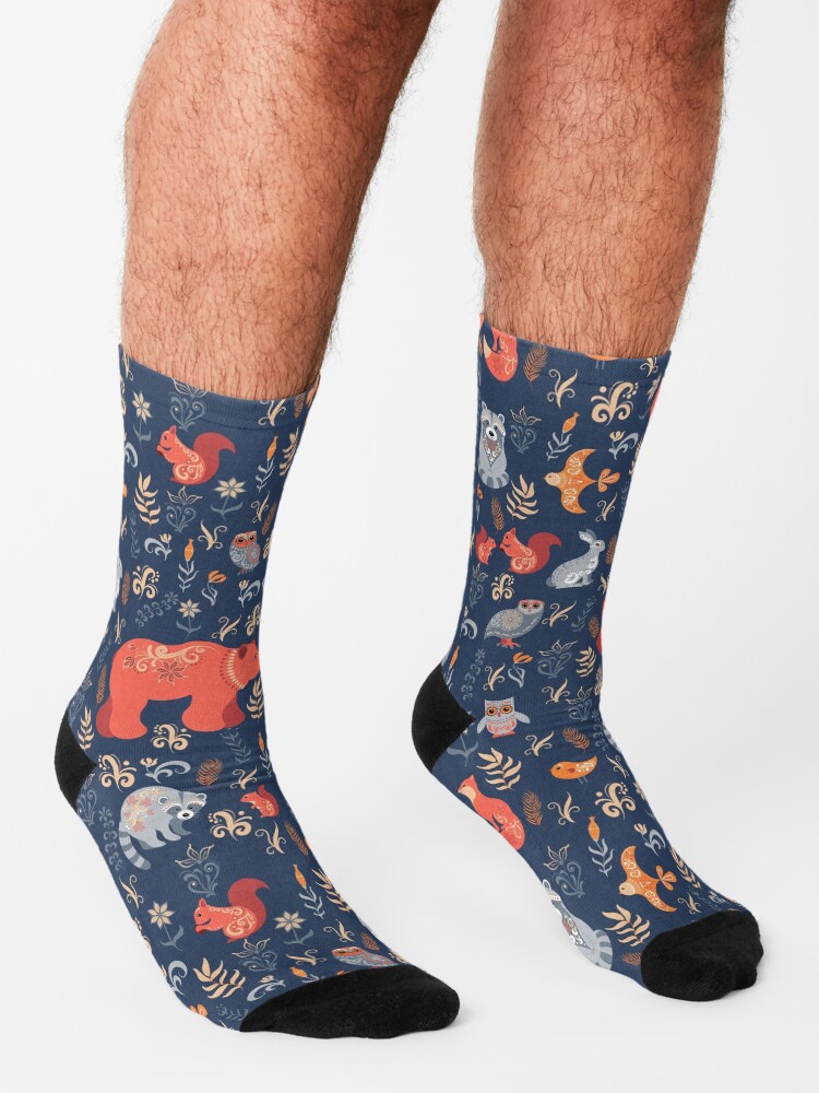 Alternate view of Fairy-tale forest. Fox, bear, raccoon, owls, rabbits, flowers and herbs on a blue background. Socks