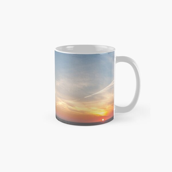 photograph a man on a huge chair at sunset in Îles-de-la-Madeleine Classic Mug