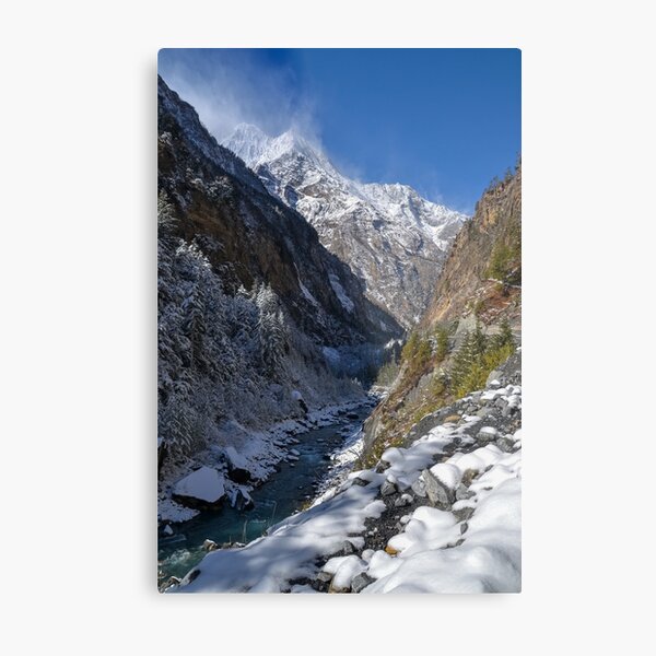 Snow covered valley and river Metal Print