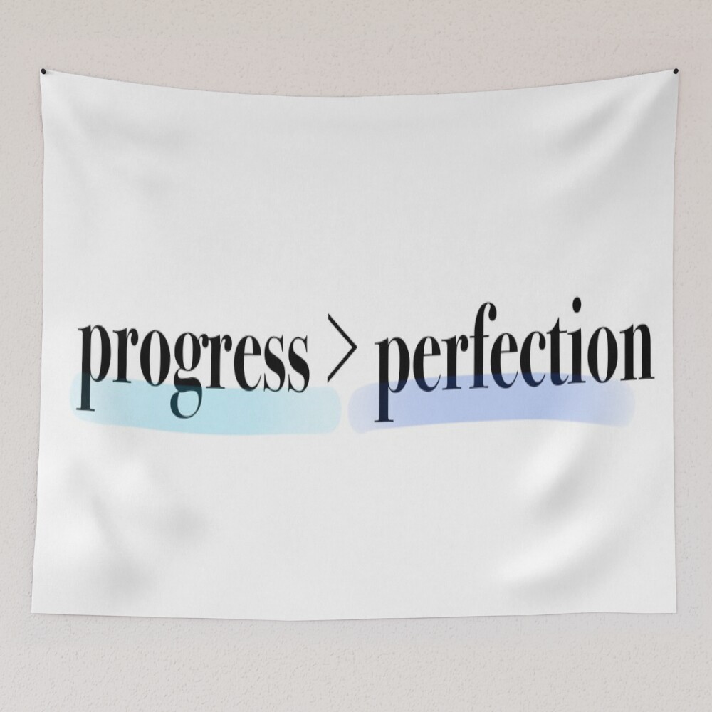 Progress Over Perfection on a tapestry
