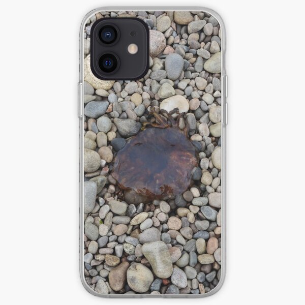 Jellyfish on a bed of pebbles iPhone Soft Case