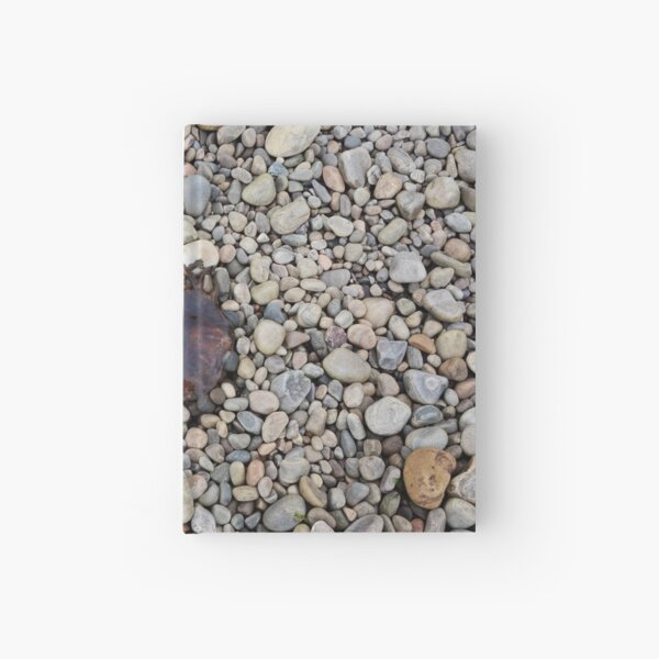 Jellyfish on a bed of pebbles Hardcover Journal