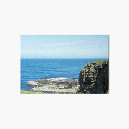 Rocks and raised ledge in sea Art Board Print