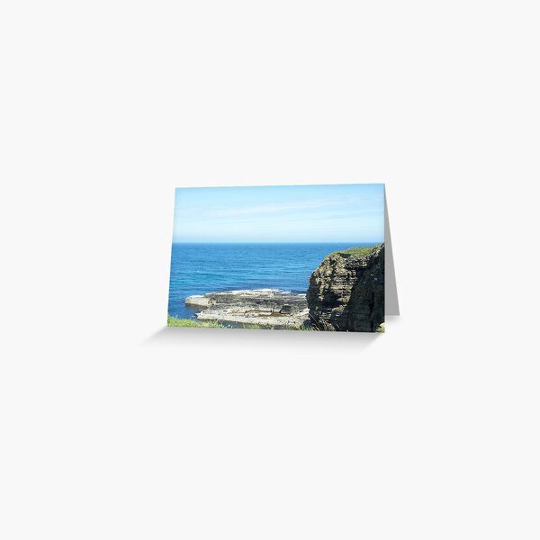 Rocks and raised ledge in sea Greeting Card