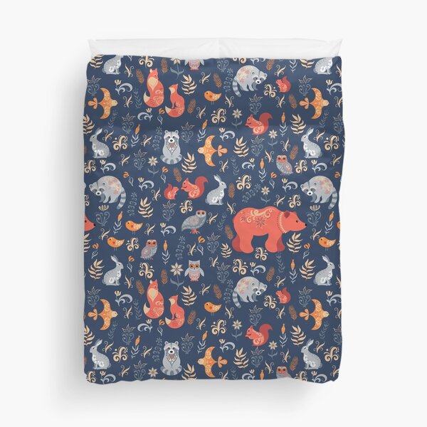 Fairy-tale forest. Fox, bear, raccoon, owls, rabbits, flowers and herbs on a blue background. Duvet Cover