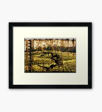 landscape with the ladder Framed Print