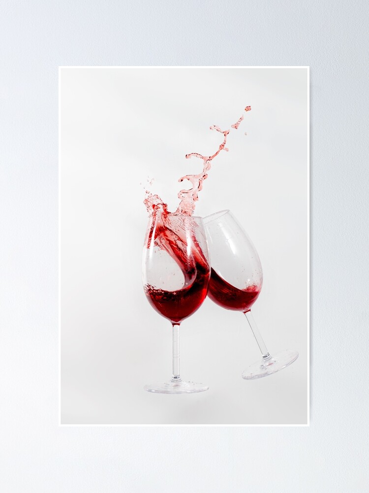 Sticker Vin rouge versé dans un verre isolé sur fond blanc