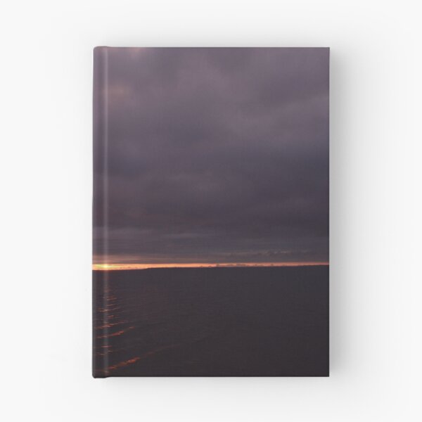 Item preview, Sunbeam from thunderclouds at sunset on a dark surface of the water designed and sold by yarvin13.