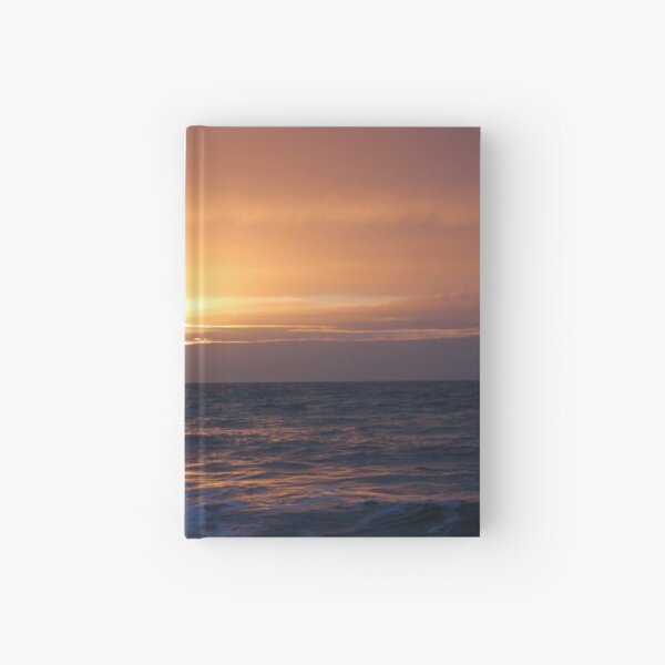 Rough sea and bloodlust sun Hardcover Journal