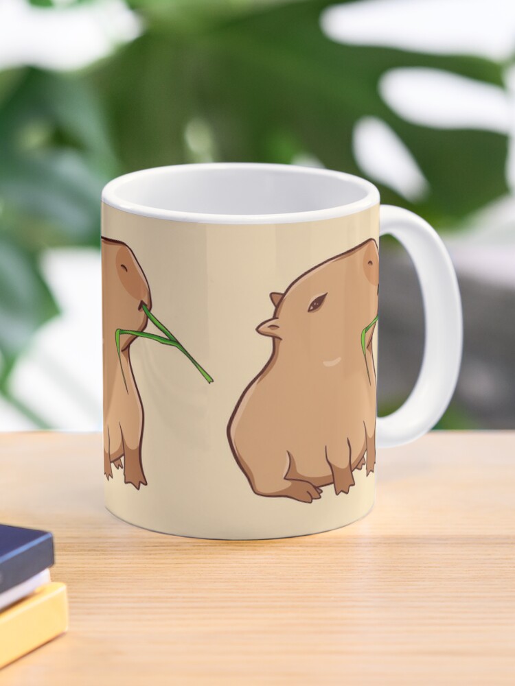 Capybara with a leaf, eat your greens! Sticker for Sale by manydoodles