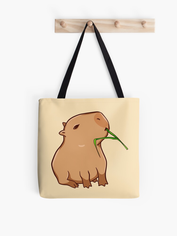 Capybara with a leaf, eat your greens! Sticker for Sale by manydoodles