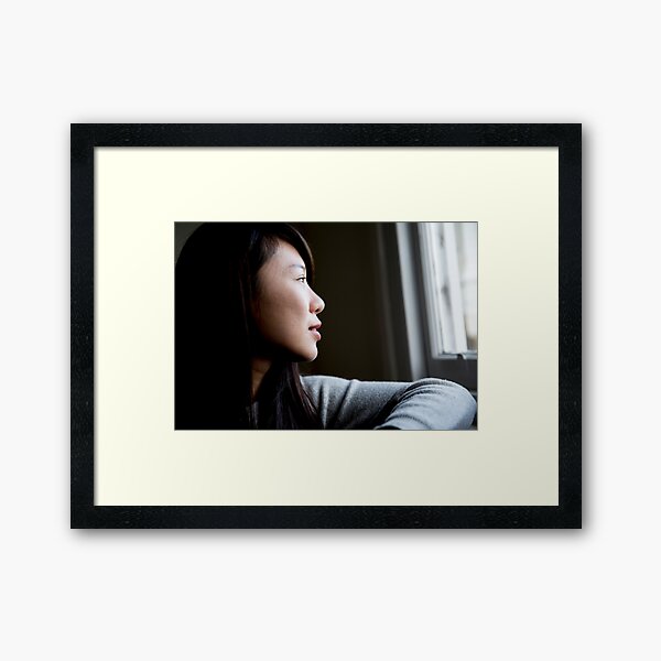 Portrait of a young woman Framed Art Print