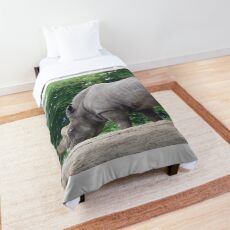 Rhinoceros outdoors Comforter