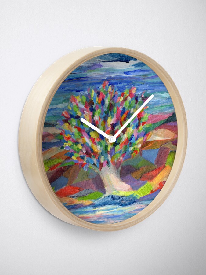 Alternate view of Dream Tree, grow your hopes and dreams. A rainbow leaved tree grows on a rocky coast by the sea in this colorful acrylic daydream. Clock