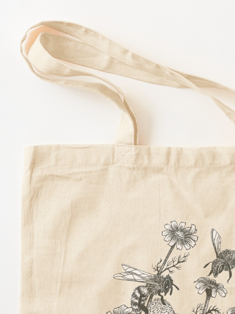 Alternate view of bees and chamomile on honey background Tote Bag