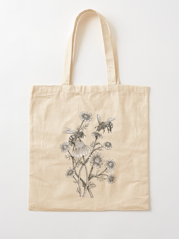 Alternate view of bees and chamomile on honey background Tote Bag