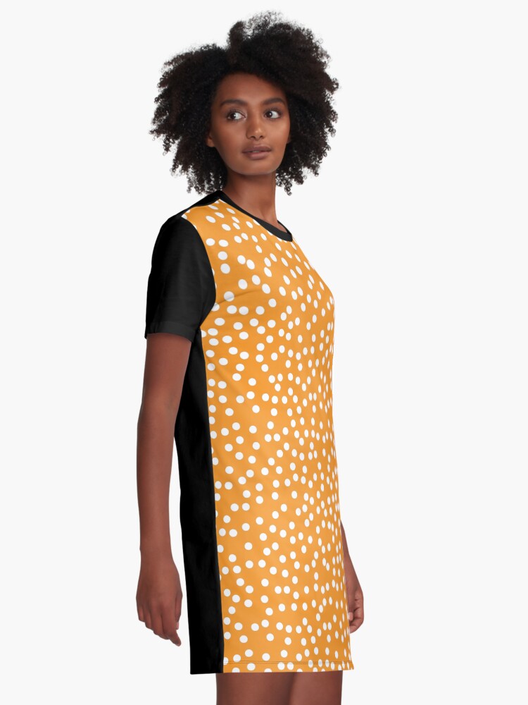 orange and white polka dot dress