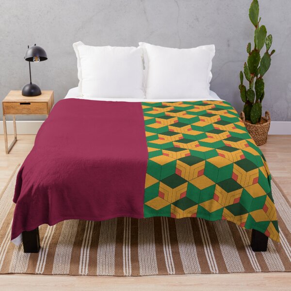 le rouge représentant Makomo et les cubes représentant Sabito. Disponible sur une variété de produits. Plaid