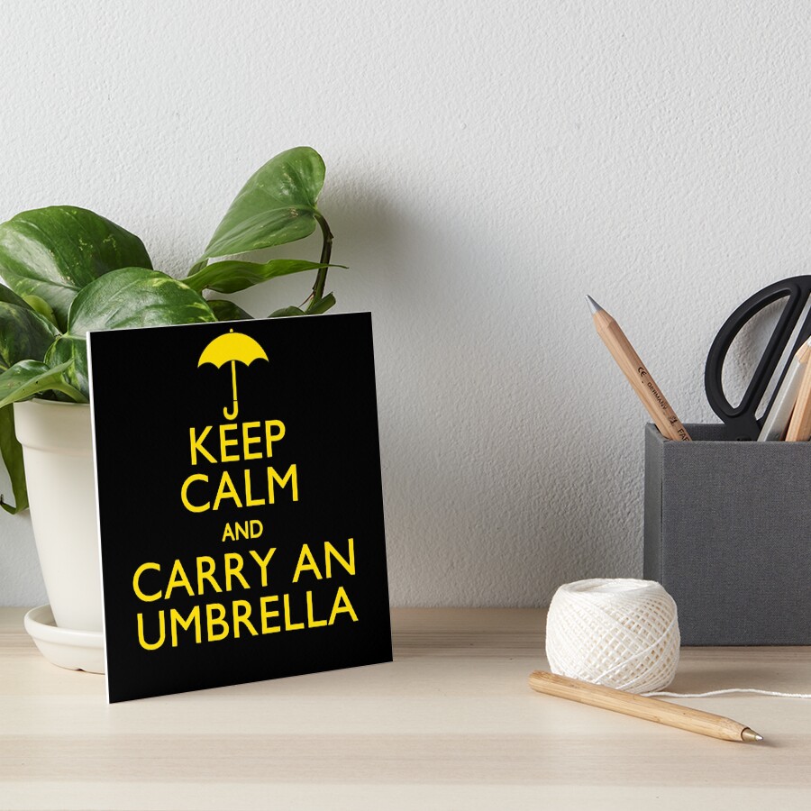 "Keep Calm And Carry An Umbrella" Art Board Print by Garaga Redbubble