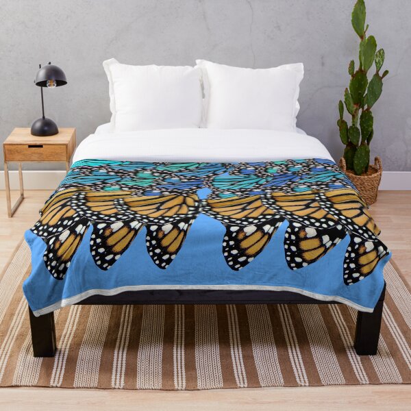 Aperçu de l'œuvre Motif papillon monarque bleu et orange créée et vendue par Stephanie  Skeem.