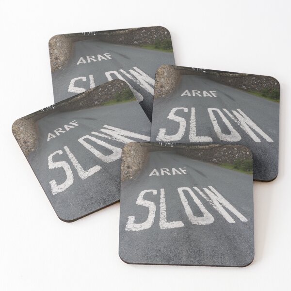 Item preview, Araf, Slow, bilingual white warning on Welsh road. designed and sold by Andy Chisholm.