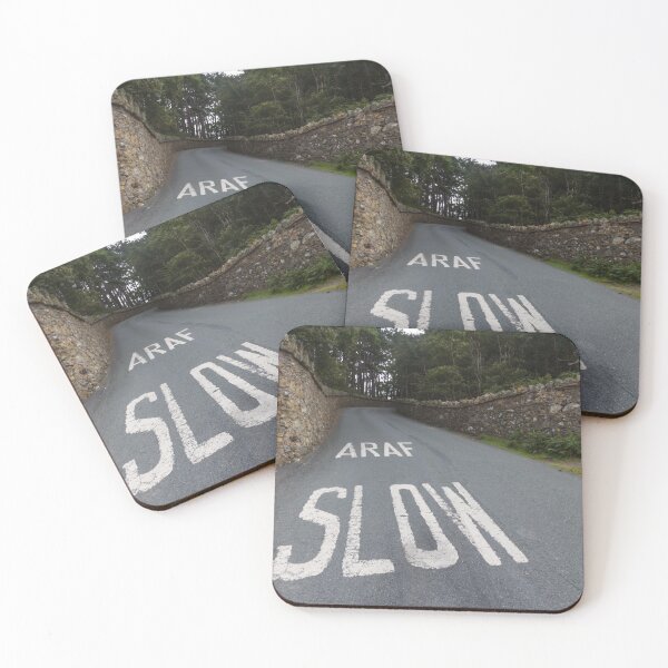 Item preview, Araf, Slow, bilingual white warning on Welsh road. designed and sold by Andy Chisholm.