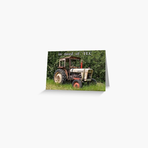 Old tractor with baked bean tin. Greeting Card