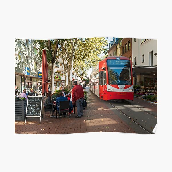 Tram passing through the pedestrian zone, Frechen, Near Cologne, Germany. Poster