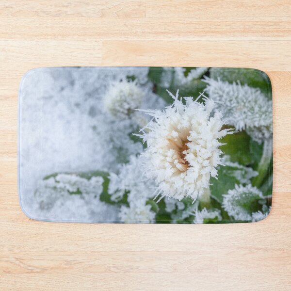 Item preview, Daisy flower frozen in winter snow and ice designed and sold by simonbratt.
