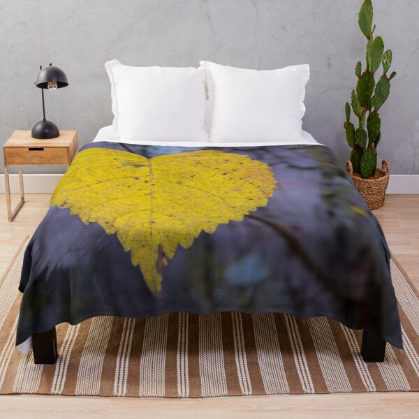Item preview, Bright Yellow Heart Shaped Leaf and Gray Bark Background designed and sold by Jon Shore.