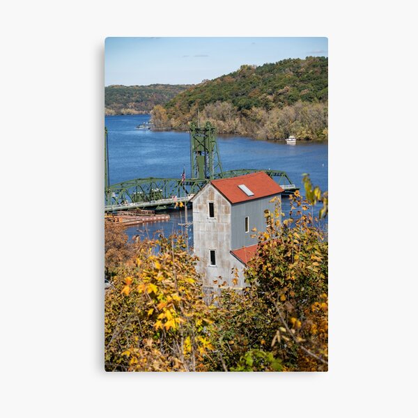 Cityscape of Stillwater, Minnesota in the fall with lift bridge and mill Canvas Print