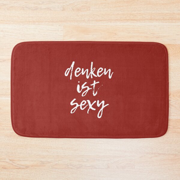 Item preview, "denken ist sexy" (German for "thinking is sexy”) in white script lettering on red designed and sold by kierkegaard.