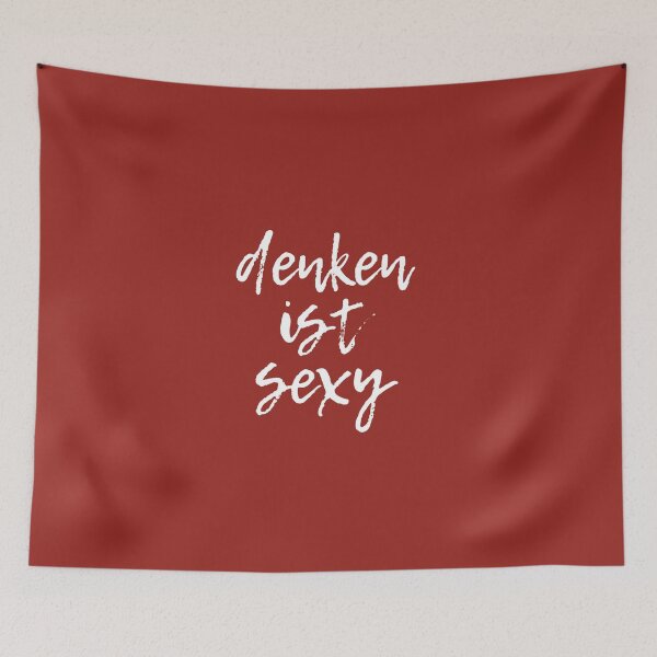 Item preview, "denken ist sexy" (German for "thinking is sexy”) in white script lettering on red designed and sold by kierkegaard.