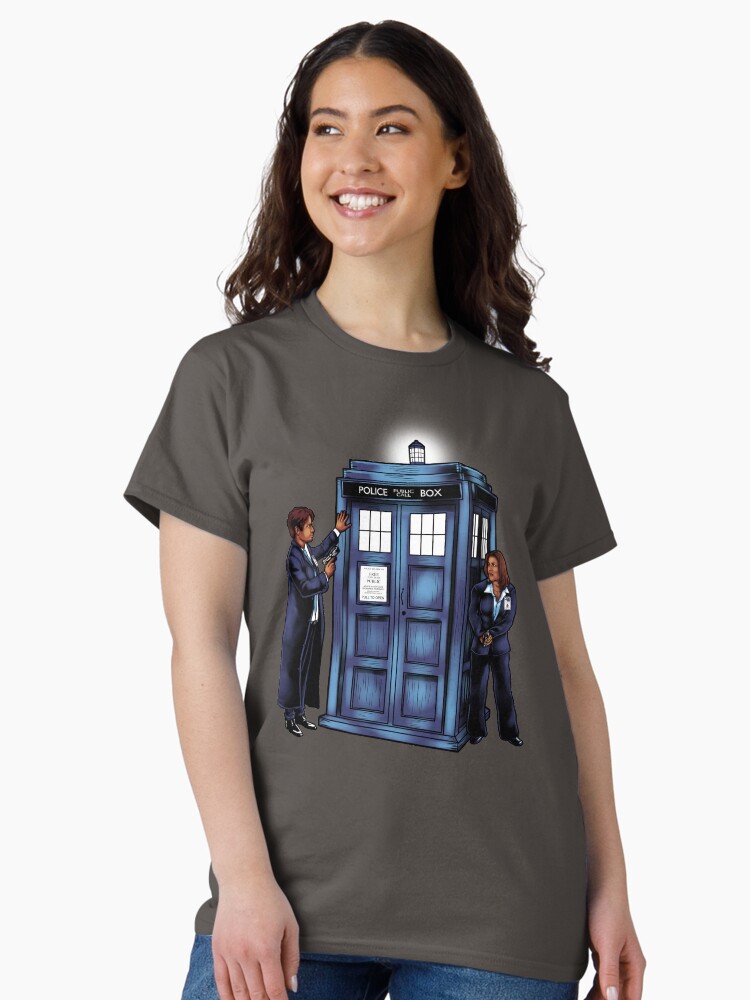 Thumbnail 1 of 7, Classic T-Shirt, The Agents have the Phone Box designed and sold by sugarpoultry.