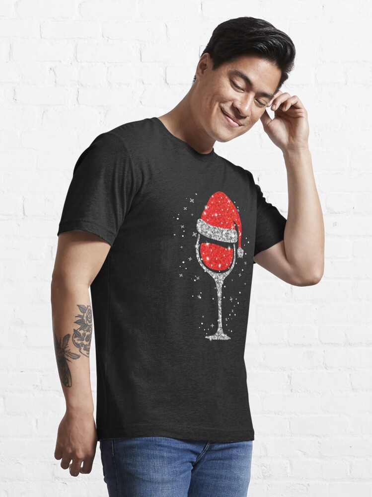 Disover Christmas Wine Glass Snowflakes Santa Hat Red Wine | Essential T-Shirt 