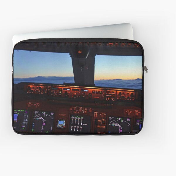 Boeing 747 cockpit view flying above the clouds in the sunset Laptop Sleeve