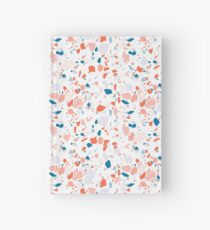 Terrazzomusterhand gezeichnet in Rosa und Blau Notizbuch