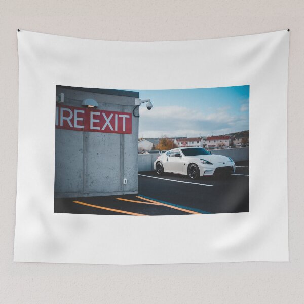 Item preview, white Nissan Nismo 370z parked on roof designed and sold by erikallen920.