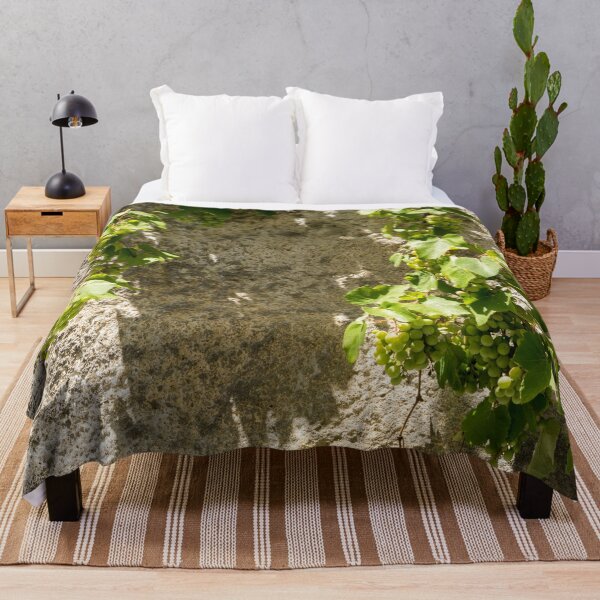 Item preview, Unusual Grape Harvest - Grapevines Trailing Down a Rough Wall designed and sold by Georgia Mizuleva.
