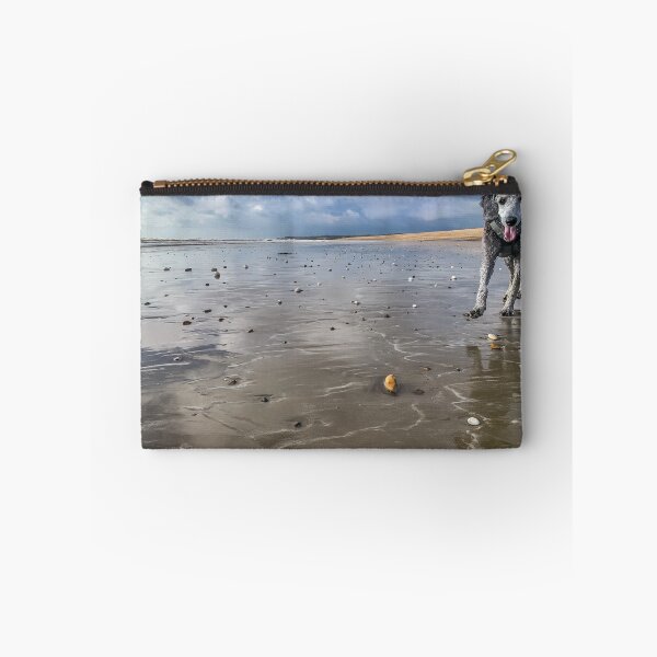 Item preview, Young silver poodle on a wet sandy beach designed and sold by RW Jemmett.