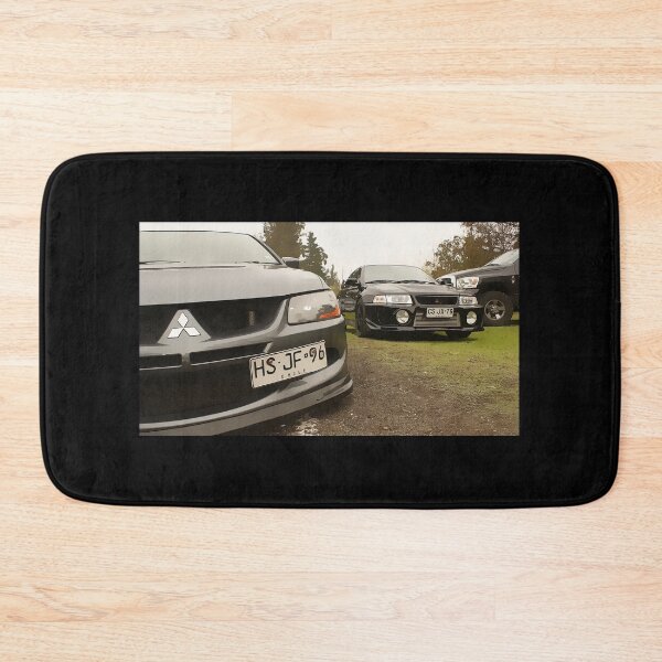 Item preview, Mitsubishi Lancer Evo IX vs Evo VI Poster – JDM Evolution Battle Art designed and sold by Road To Track.