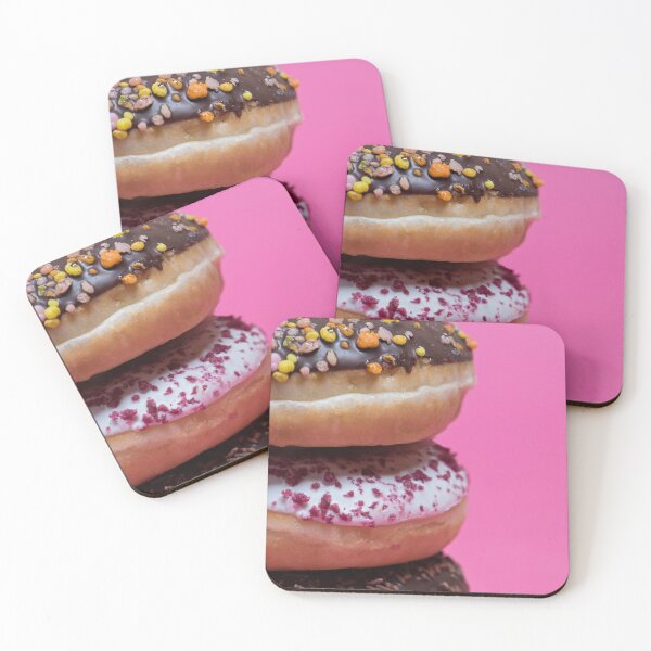 Item preview, Macro shot of stack of donuts over pink background designed and sold by anytka.