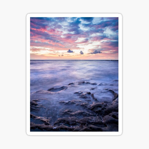 Long exposure seascape rocks at twilight Sticker